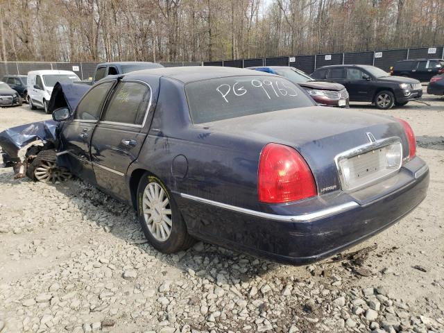 Photo 2 from auction – 2003 LINCOLN TOWN CAR E with VIN 1LNHM81W73Y689965