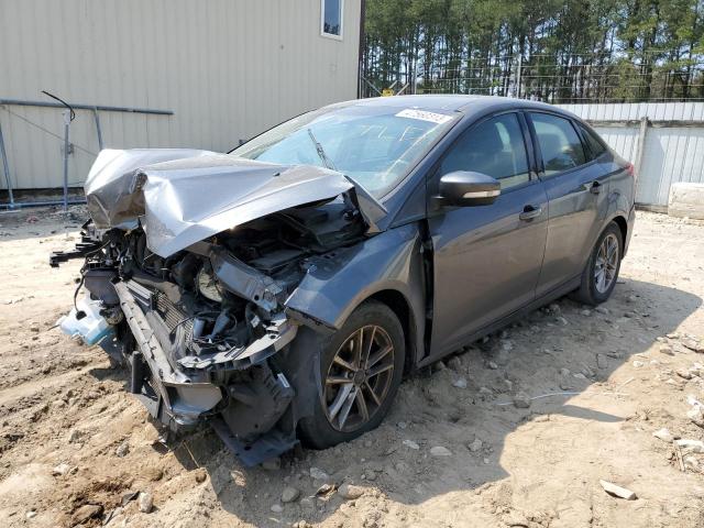 FORD FOCUS SE 2017 with VIN 1FADP3F29HL312518 - Photo from auction