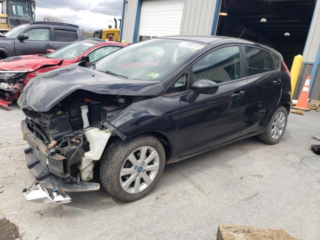 FORD FIESTA SE 2012 with VIN 3FADP4EJ9CM114141 - Photo from auction