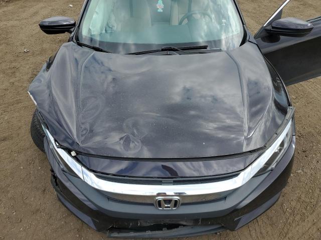 Photo 11 from auction – 2016 HONDA CIVIC LX with VIN 19XFC2F51GE229997