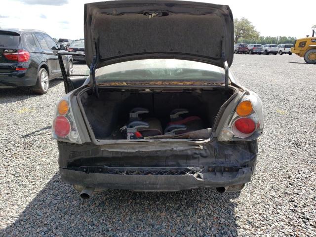 Photo 6 from auction – 2002 NISSAN ALTIMA SE with VIN 1N4BL11E72C258085
