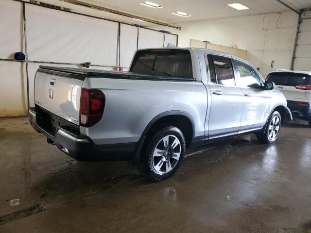 Photo 3 from auction – 2019 HONDA RIDGELINE with VIN 5FPYK3F52KB016701