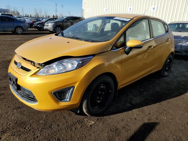 FORD FIESTA SES 2012 with VIN 3FADP4FJ0CM174694 - Photo from auction