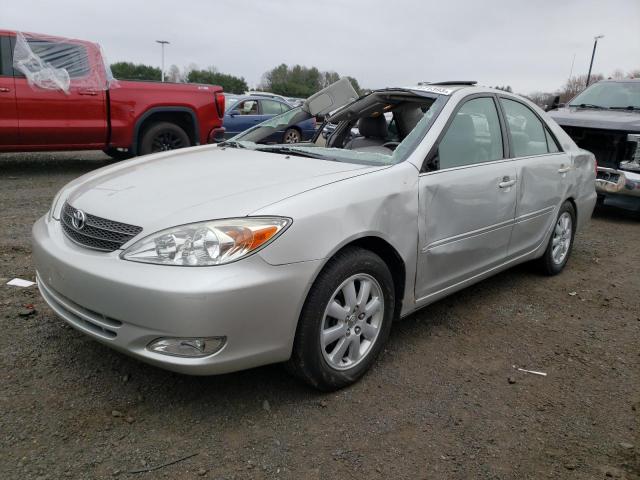 TOYOTA CAMRY LE 2003 with VIN 4T1BE30K93U649706 - Photo from auction