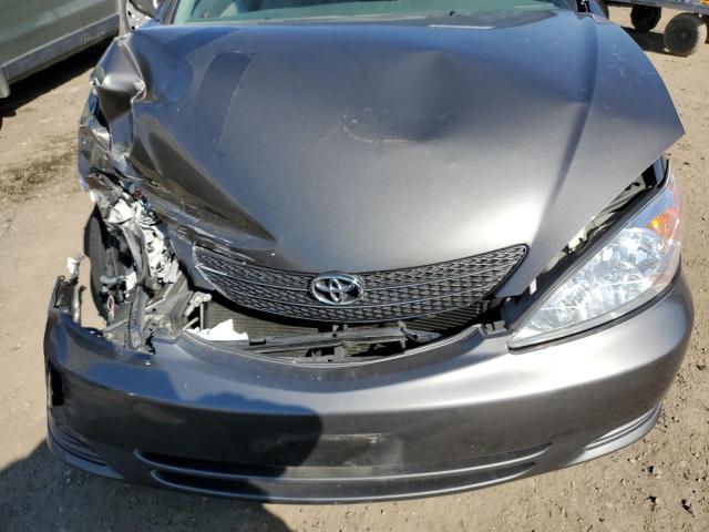Photo 11 from auction – 2003 TOYOTA CAMRY LE with VIN 4T1BF30K23U558984