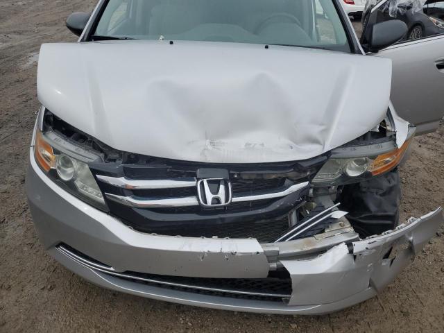 Photo 12 from auction – 2014 HONDA ODYSSEY LX with VIN 5FNRL5H28EB077161
