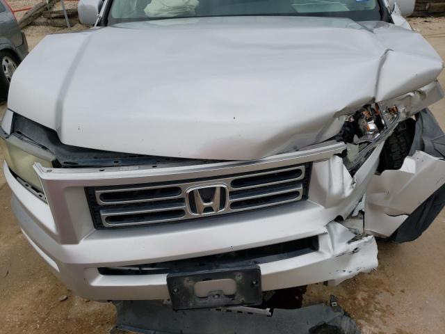 Photo 11 from auction – 2006 HONDA RIDGELINE with VIN 2HJYK16506H544908