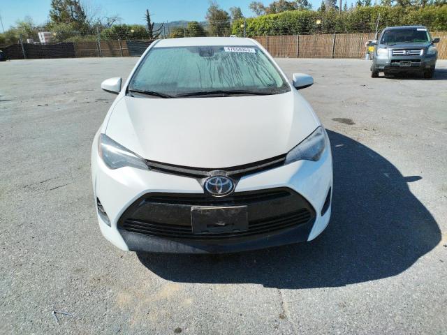 Photo 5 from auction – 2018 TOYOTA COROLLA L with VIN 5YFBURHE1JP849630