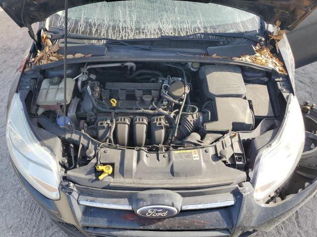 Photo 11 from auction – 2013 FORD FOCUS SE with VIN 1FADP3F29DL371868