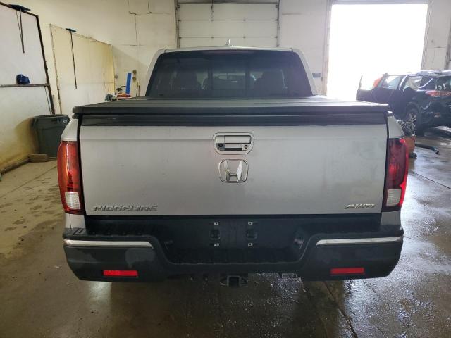 Photo 6 from auction – 2019 HONDA RIDGELINE with VIN 5FPYK3F52KB016701