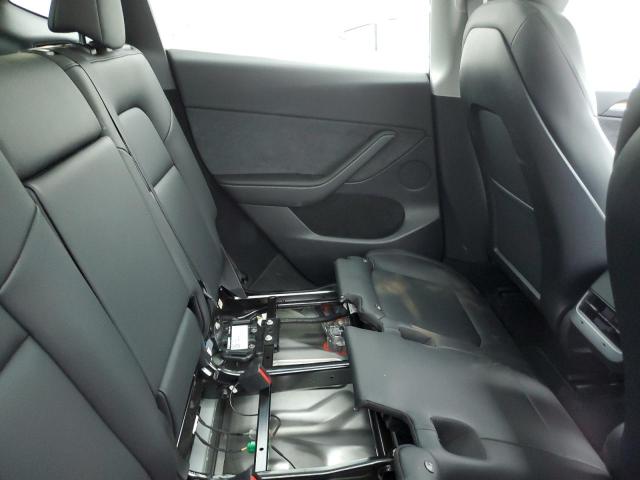 Photo 11 from auction – 2023 TESLA MODEL Y with VIN 7SAYGDEE4PA081042