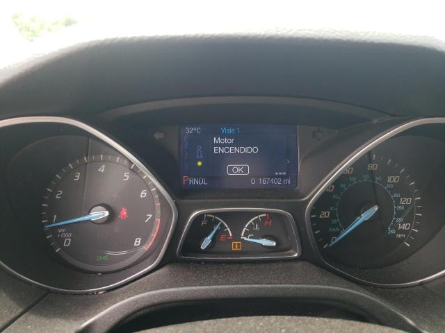 Photo 9 from auction – 2014 FORD FOCUS with VIN 1FADP3F2XEL436695