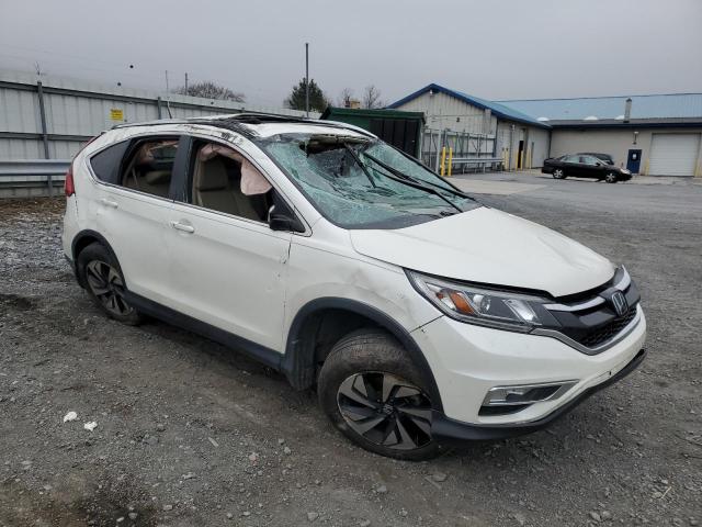 Photo 4 from auction – 2016 HONDA CR-V TOURI with VIN 5J6RM4H99GL038481