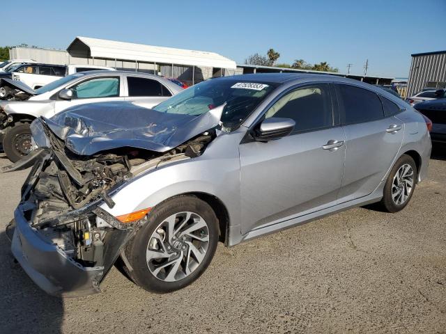 HONDA CIVIC EX 2017 with VIN 19XFC2F72HE232040 - Photo from auction