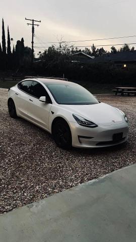 TESLA MODEL 3 2018 with VIN 5YJ3E1EBXJF066766 - Photo from auction
