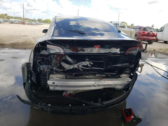 Photo 6 from auction – 2021 TESLA MODEL 3 with VIN 5YJ3E1EC2MF061106