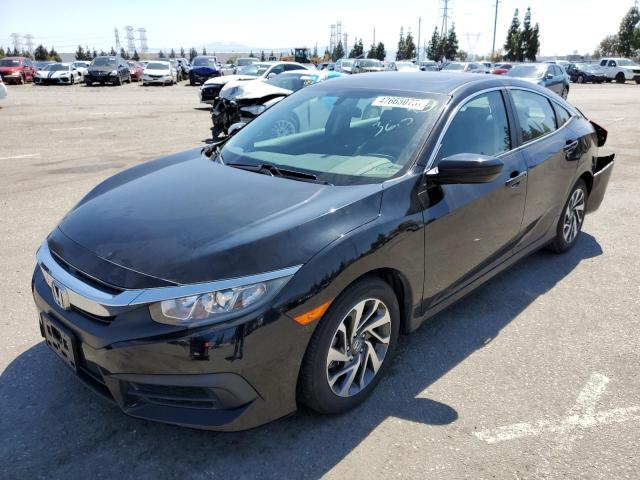 HONDA CIVIC EX 2018 with VIN 2HGFC2F71JH548329 - Photo from auction