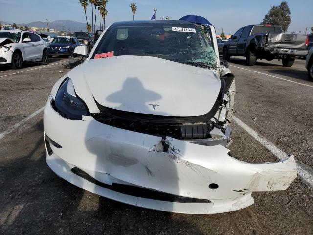 Photo 5 from auction – 2022 TESLA MODEL 3 with VIN 5YJ3E1EA9NF302644