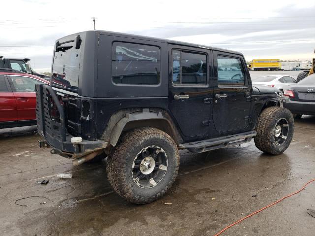 Photo 3 from auction – 2010 JEEP WRANGLER U with VIN 1J4BA3H13AL125279