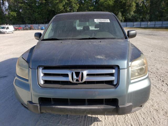 Photo 5 from auction – 2006 HONDA PILOT LX with VIN 5FNYF28106B020804