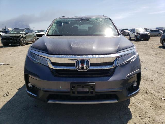 Photo 5 from auction – 2022 HONDA PILOT TOUR with VIN 5FNYF5H61NB004977