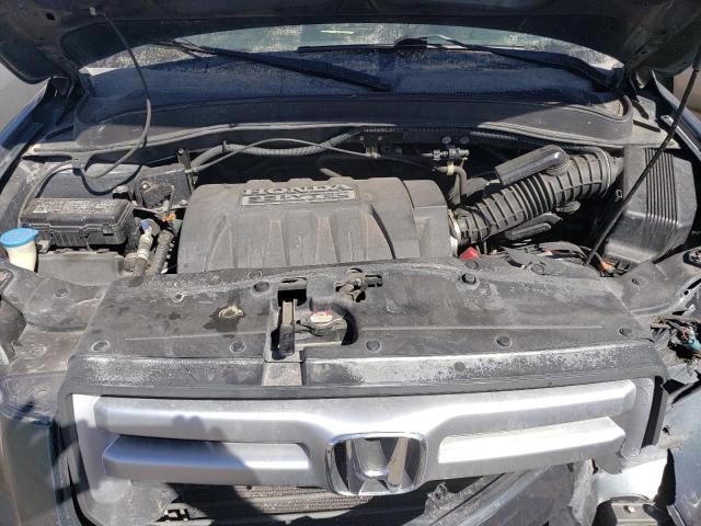 Photo 12 from auction – 2006 HONDA PILOT LX with VIN 5FNYF28156B046167