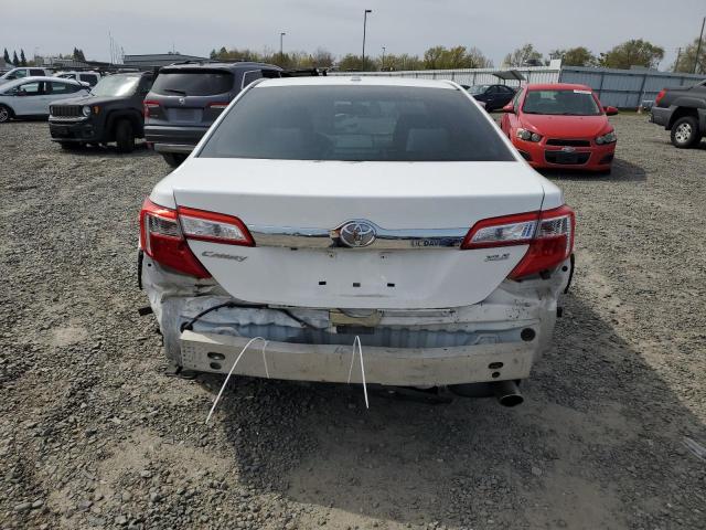 Photo 6 from auction – 2014 TOYOTA CAMRY L with VIN 4T4BF1FK9ER392404