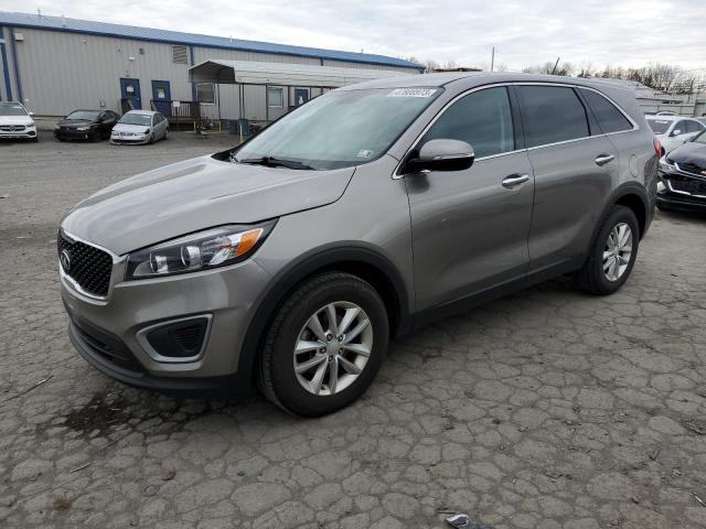 KIA SORENTO LX 2016 with VIN 5XYPG4A30GG057068 - Photo from auction