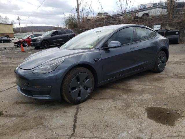 TESLA MODEL 3 2022 with VIN 5YJ3E1EB9NF182885 - Photo from auction