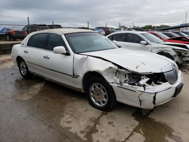Photo 4 from auction – 2002 LINCOLN TOWN CAR C with VIN 1LNHM83W52Y645992