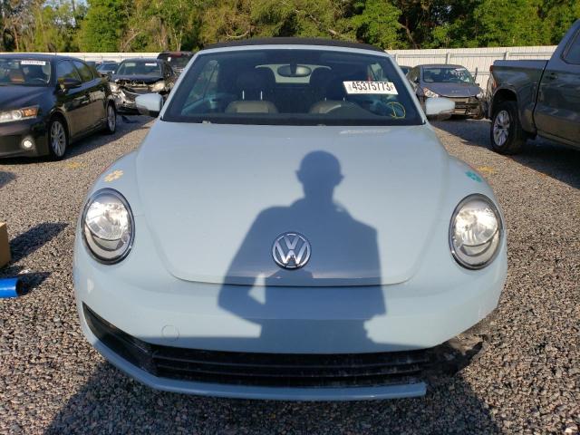 Photo 5 from auction – 2013 VOLKSWAGEN BEETLE with VIN 3VW5X7AT4DM826076