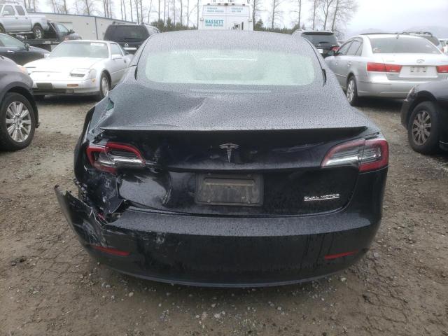 Photo 6 from auction – 2021 TESLA MODEL 3 with VIN 5YJ3E1EC0MF914277