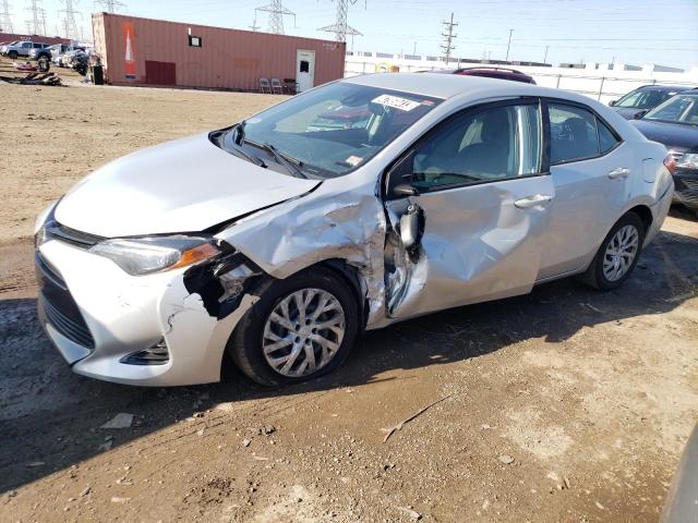 TOYOTA COROLLA L 2018 with VIN 5YFBURHE8JP801056 - Photo from auction
