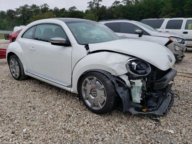 Photo 4 from auction – 2014 VOLKSWAGEN BEETLE with VIN 3VWJL7AT7EM655769