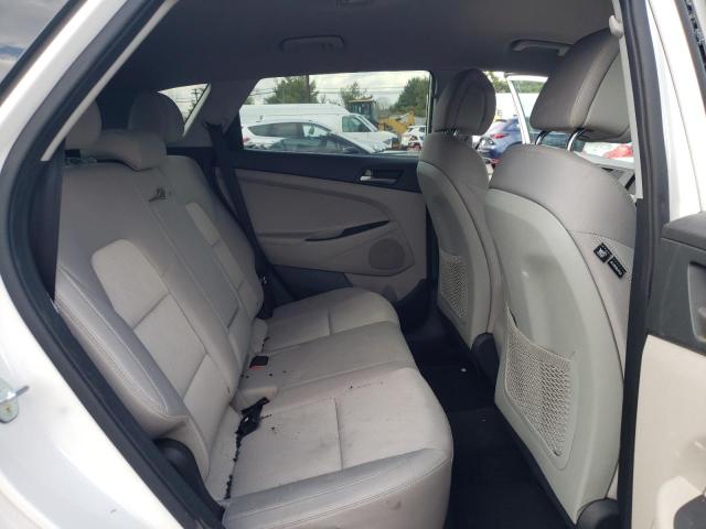 Photo 11 from auction – 2018 HYUNDAI TUCSON SE with VIN KM8J2CA49JU684599