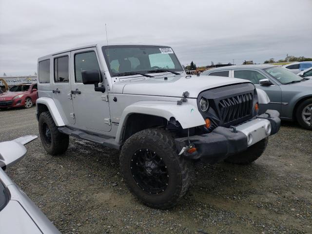 Photo 4 from auction – 2011 JEEP WRANGLER U with VIN 1J4BA5H16BL620153