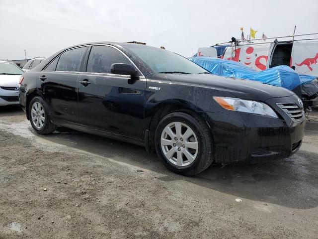 Photo 4 from auction – 2007 TOYOTA CAMRY HYBR with VIN JTNBB46K873043752