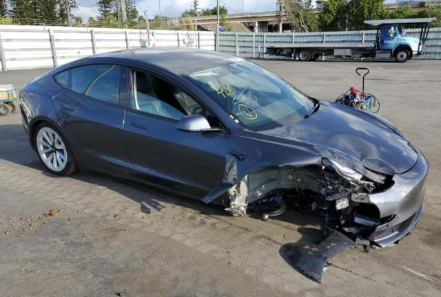 Photo 4 from auction – 2022 TESLA MODEL 3 with VIN 5YJ3E1EB3NF192621