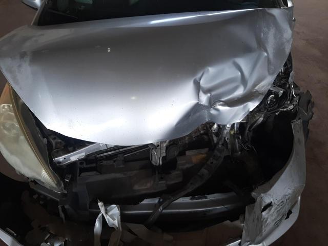 Photo 11 from auction – 2014 TOYOTA PRIUS C with VIN JTDKDTB35E1559308
