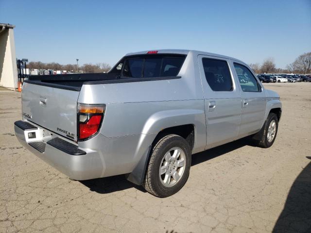 Photo 3 from auction – 2006 HONDA RIDGELINE with VIN 2HJYK16406H522155
