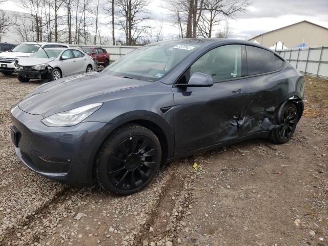 TESLA MODEL Y 2023 with VIN 7SAYGAEE5PF611231 - Photo from auction