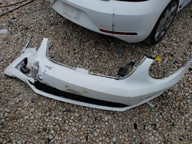 Photo 12 from auction – 2014 VOLKSWAGEN BEETLE with VIN 3VWJL7AT7EM655769