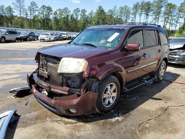 HONDA PILOT TOUR 2011 with VIN 5FNYF4H90BB012522 - Photo from auction