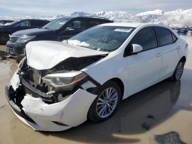 TOYOTA COROLLA L 2014 with VIN 5YFBURHE3EP038739 - Photo from auction