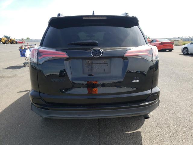 Photo 6 from auction – 2018 TOYOTA RAV4 LE with VIN 2T3BFREV6JW743288