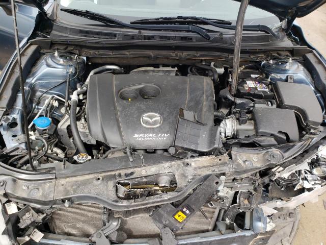 Photo 11 from auction – 2015 MAZDA 3 SV with VIN JM1BM1T73F1242599