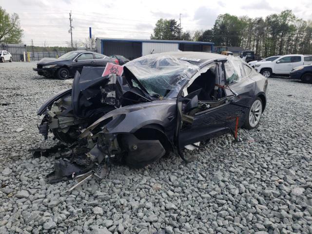 TESLA MODEL 3 2021 with VIN 5YJ3E1EB6MF868722 - Photo from auction