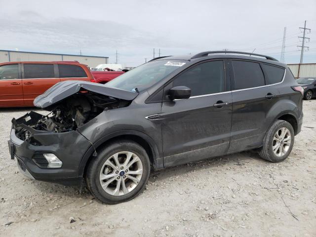 FORD ESCAPE SE 2018 with VIN 1FMCU0GD5JUA37061 - Photo from auction
