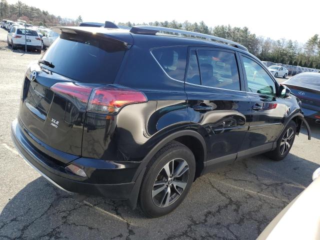Photo 3 from auction – 2017 TOYOTA RAV4 XLE with VIN 2T3RFREVXHW544379
