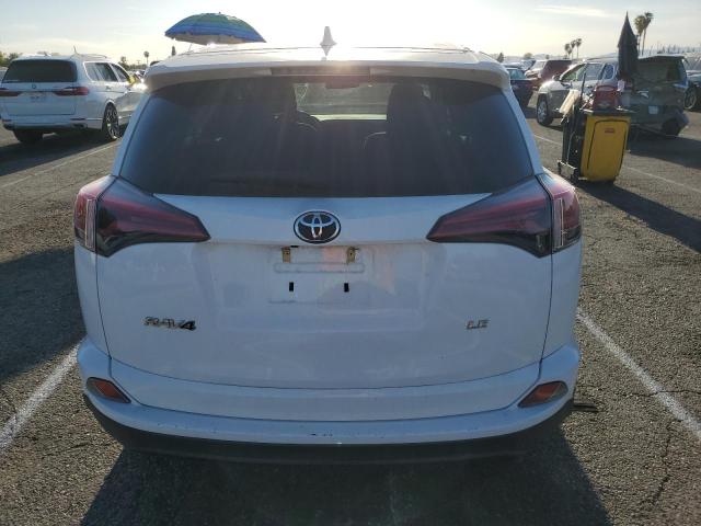 Photo 6 from auction – 2018 TOYOTA RAV4 LE with VIN 2T3ZFREV9JW438074